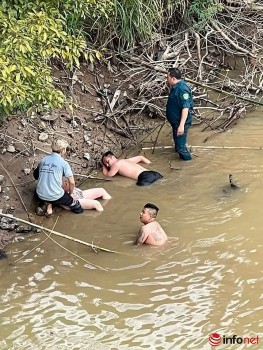 Chuyện cảm động sau bức ảnh thanh niên nằm đuối sức sau khi nhảy sông cứu người