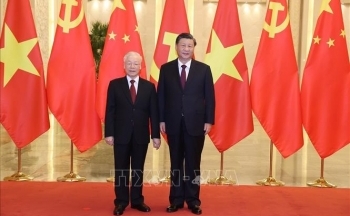 Tổng Bí thư Nguyễn Phú Trọng và Tổng Bí thư Trung Quốc Tập Cận Bình trao đổi Thư chúc mừng năm mới
