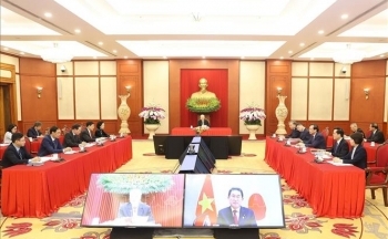 Tổng Bí thư hội đàm trực tuyến cấp cao với Chủ tịch Đảng Dân chủ Tự do, Thủ tướng Nhật Bản