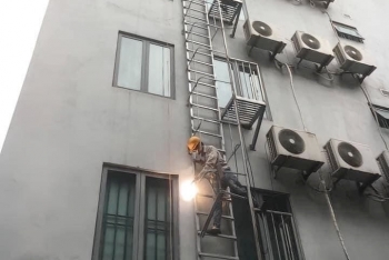 Đua nhau xây dựng thang thoát hiểm ngoài trời: Rủi ro tiềm ẩn