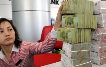 Nới lỏng chính sách tiền tệ để giảm lãi suất?