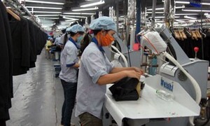 Xuất khẩu dệt may tăng trưởng trong khó khăn