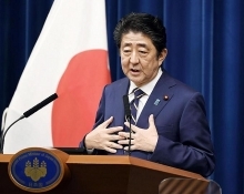 Japan's Abe says vigilant to global economic risks clouding recovery