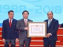 PM requests VietinBank to boost transparency, financial capacity