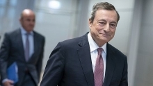 Euro slips as ECB's Draghi lowers growth forecast for Europe
