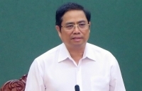 Trưởng ban Tổ chức Trung ương tặng quà các gia đình chính sách