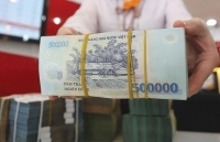 Tín dụng chững lại, dòng tiền đổ dồn về ngân hàng