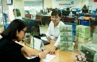 Chuẩn mực an toàn tăng, nợ xấu giảm mạnh