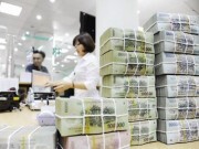 Khó giảm lãi suất cho vay và nợ xấu