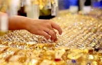 Giá vàng sụt giảm từ đỉnh cao 7 năm