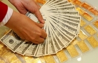Cuối tuần, giá vàng loạn nhịp, USD đứng im