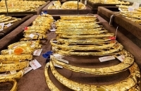 Giá vàng và USD tiếp tục giảm