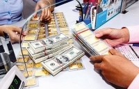 Giá vàng thế giới tăng mạnh, USD loạn nhịp