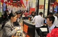 Vàng trong nước giảm nhẹ, tỷ giá tại nhiều ngân hàng đi xuống