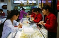 Trung Quốc tuyên bố “không vội trả đũa”, giá vàng giảm mạnh