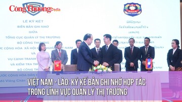 Việt Nam - Lào: Ký kết Bản ghi nhớ hợp tác trong lĩnh vực Quản lý thị trường