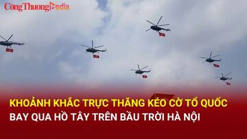 Mãn nhãn trực thăng kéo cờ Tổ quốc 'xé gió, bay lượn' trên bầu trời Hà Nội