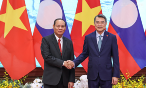 Lào quyết tâm cùng Việt Nam gìn giữ, vun đắp và phát huy mối quan hệ hữu nghị vĩ đại