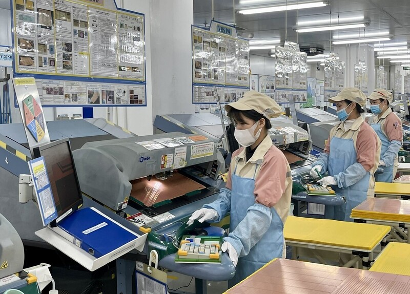 Doanh nghiệp được đánh giá là bệ đỡ, động lực cho tăng trưởng kinh tế. Ảnh: TTX