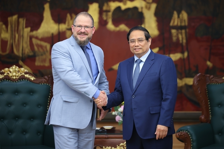 Thủ tướng Phạm Minh Chính tiếp ông Cristiano Amon, Chủ tịch kiêm Tổng Giám đốc điều hành tập đoàn Qualcomm - Ảnh: VGP/Nhật Bắc