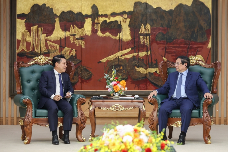 Thủ tướng Phạm Minh Chính nhiệt liệt chúc mừng những thành tựu quan trọng của Lào trong việc giữ vững ổn định chính trị - xã hội và quốc phòng an ninh, phát triển kinh tế - Lào - Ảnh: VGP/Nhật Bắc
