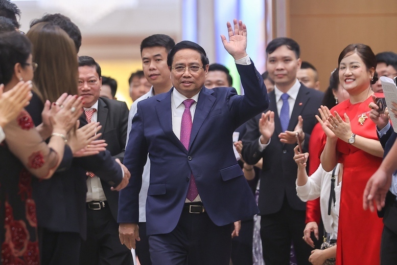 Thủ tướng Phạm Minh Chính tới dự gặp mặt cộng đồng doanh nghiệp - Ảnh: VGP/Nhật Bắc