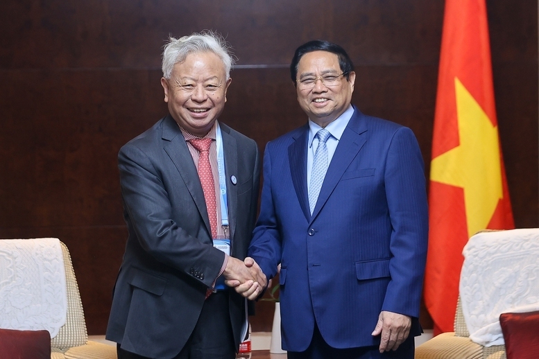 Thủ tướng Phạm Minh Chính tiếp Chủ tịch Ngân hàng Đầu tư cơ sở hạ tầng châu Á (AIIB) Kim Lập Quần - Ảnh: VGP/Nhật Bắc