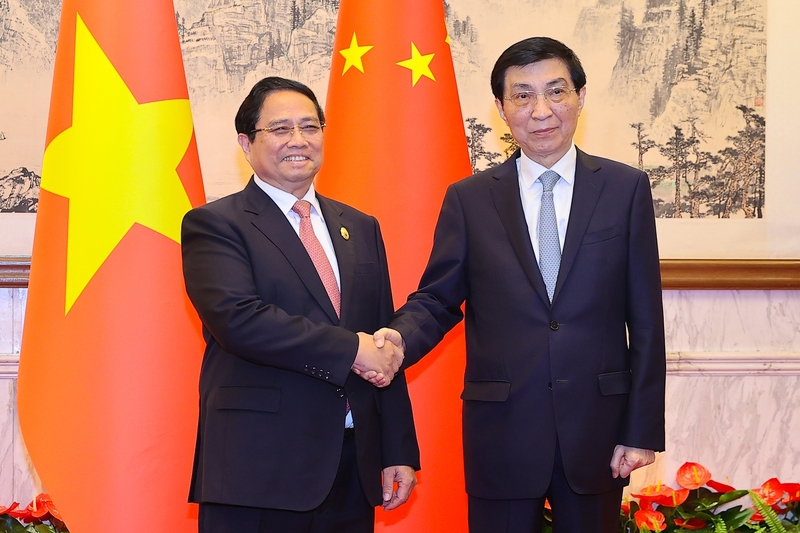 Thủ tướng Phạm Minh Chính hội kiến Chủ tịch Chính hiệp toàn quốc Trung Quốc. Ảnh: VGP/Nhật Bắc