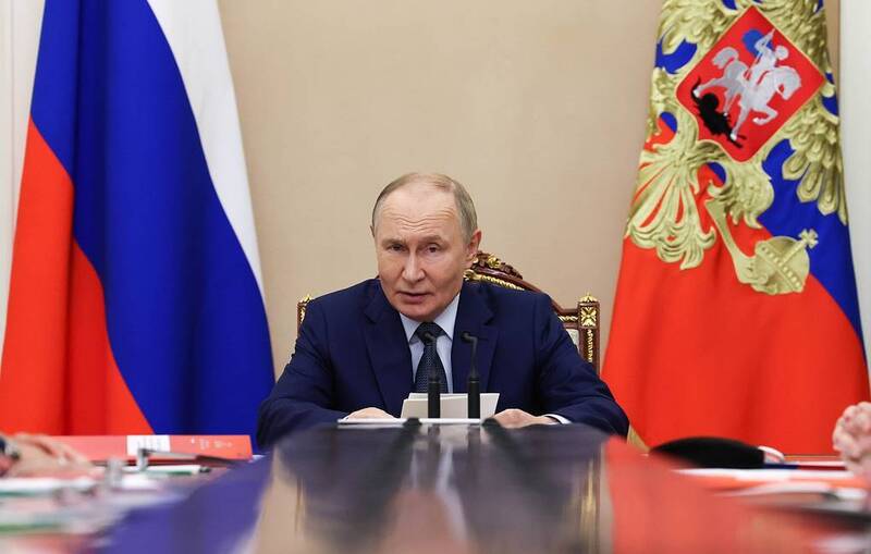 Tổng thống V.Putin tại Văn phòng Báo chí và Thông tin. Ảnh: Tass.