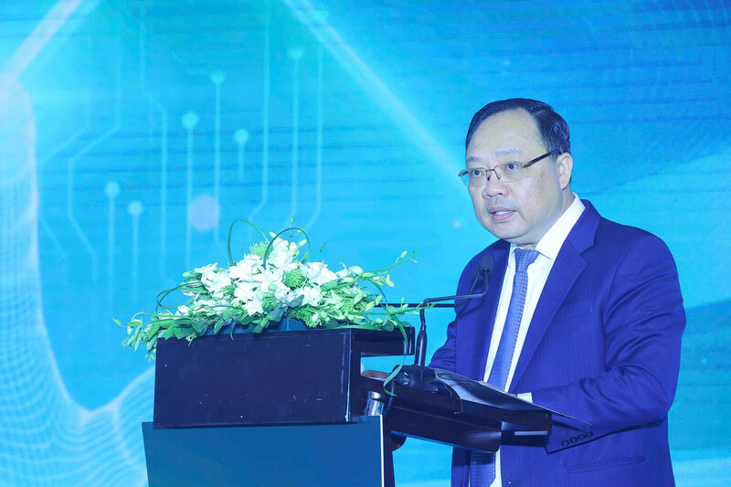 Ông Phạm Anh Tuấn, Vụ trưởng Vụ Thanh toán, Ngân hàng Nhà nước phát biểu. Ảnh: Duy Minh