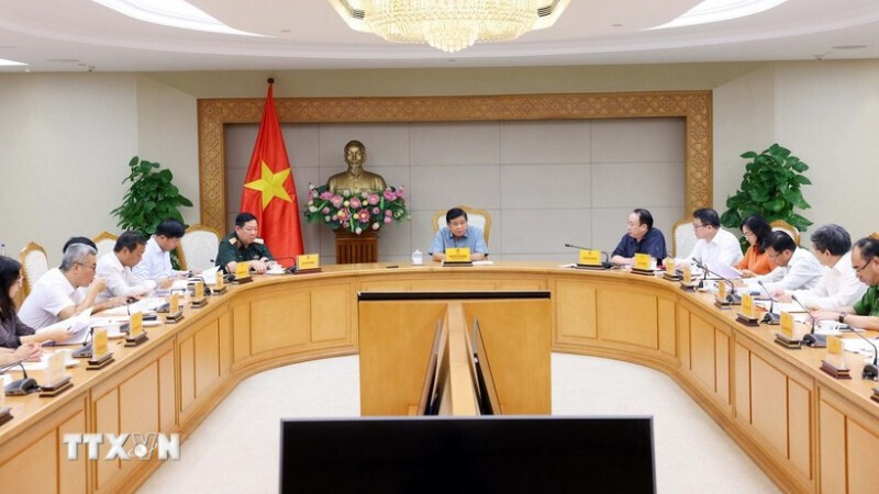 Quang cảnh cuộc họp về các dự án hợp tác Việt Nam - Lào. Ảnh: Phạm Kiên/TTXVN