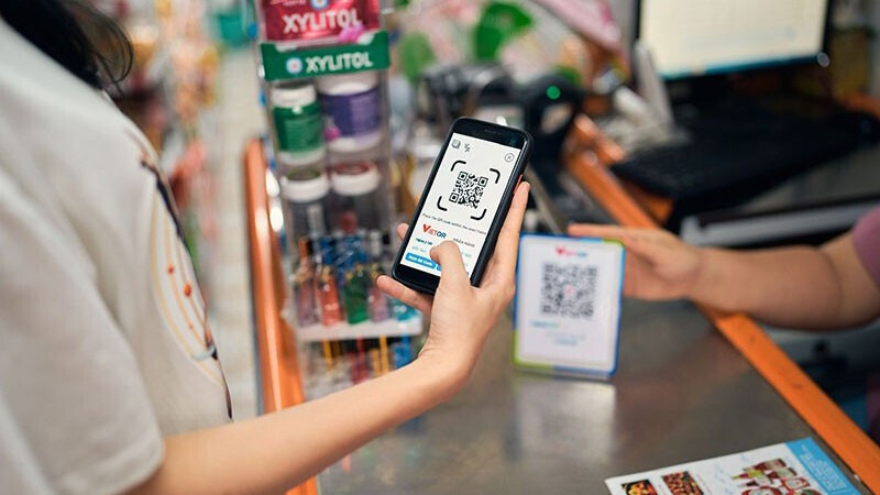 Trong 8 tháng đầu năm 2025, giao dịch qua QR Code tăng 63,65% về số lượng và 152,97% về giá trị. Ảnh: Duy Minh