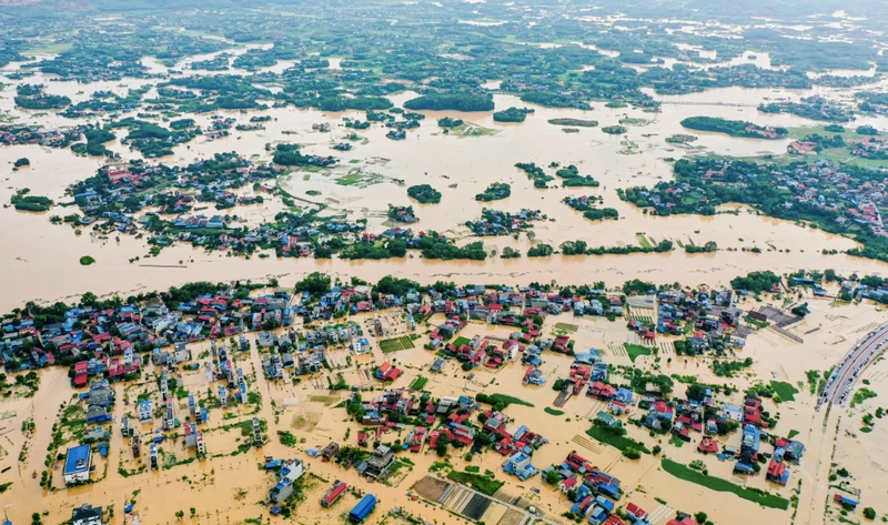 Lũ sông Cầu dâng cao gây ngập lụt nhiều phường ở Thái Nguyên - Ảnh: Duy Khắc