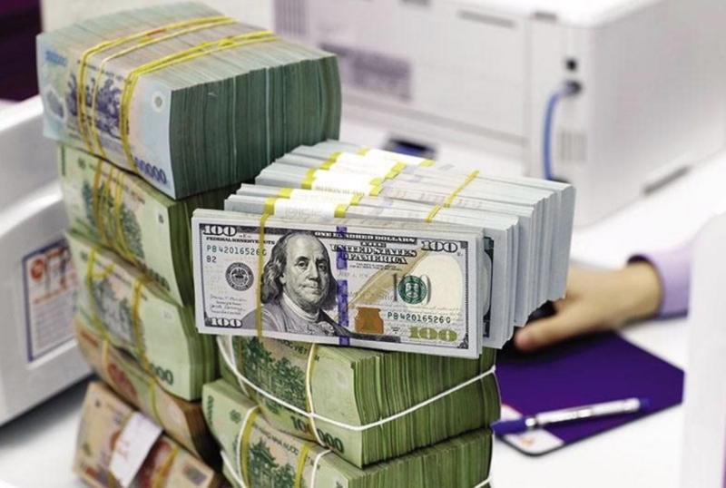 Fed vừa tiếp tục giảm lãi suất, đồng USD lập tức biến động. Ảnh: Duy Minh