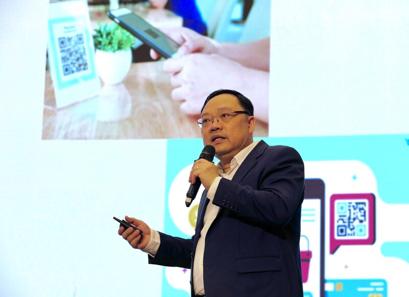 Ông Phạm Anh Tuấn, Vụ trưởng Vụ thanh toán, Ngân hàng Nhà nước phát biểu. Ảnh: Lan Anh