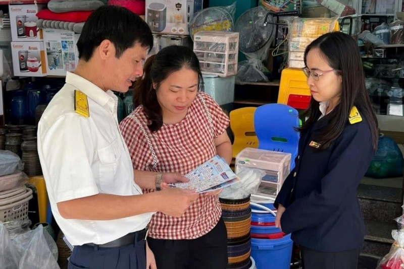 Ngành Thuế hỗ trợ hộ kinh doanh thực hiện tự kê khai, tự nộp thuế. Ảnh minh họa