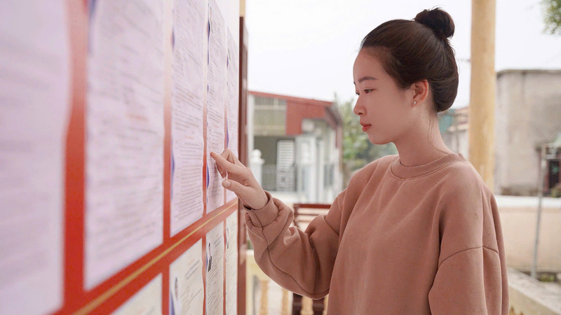 Gia đình ba thế hệ cùng đi bầu cử, lan tỏa trách nhiệm công dân - 1