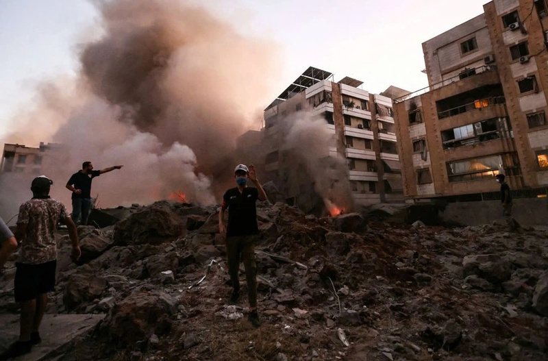 Israel nhắm vào các tòa nhà được cho là cơ quan đầu não của Hezbollah ở ngoại ô Beirut ngày 27/9. Ảnh: AFP