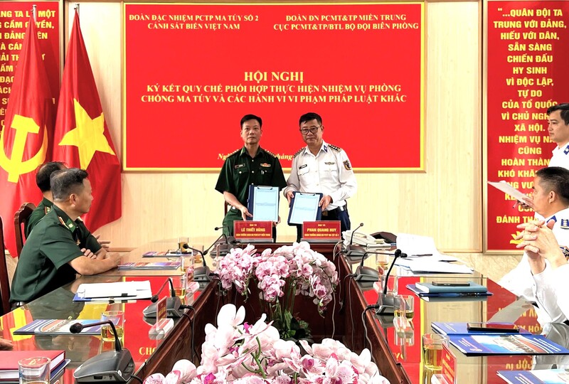 Các đơn vị ký kết quy chế phối hợp. Ảnh: Tuấn Anh