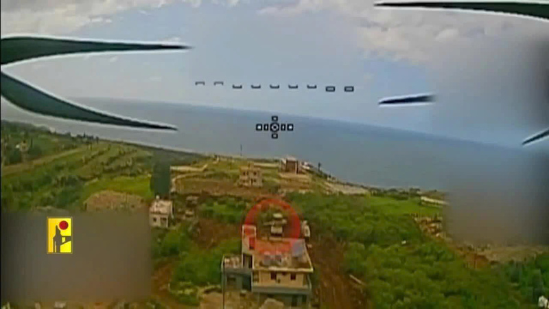 Drone Hezbollah tập kích xe tăng, thiết giáp Israel. Ảnh cắt từ video: Al Jazeera