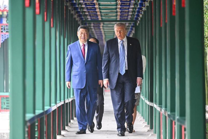 Chủ tịch Trung Quốc Tập Cận Bình chào đón Tổng thống Mỹ Donald Trump khi ông Trump tới Trung Nam Hải ở Bắc Kinh, Trung Quốc, ngày 15/5/2026. Ảnh: Xinhua