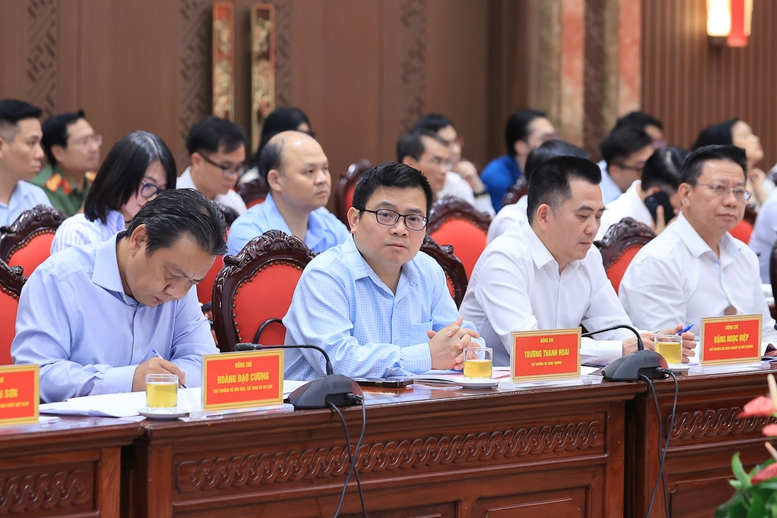 Thứ trưởng Bộ Công Thương Trương Thanh Hoài và các đại biểu dự cuộc làm việc - Ảnh: VGP/Nhật Bắc