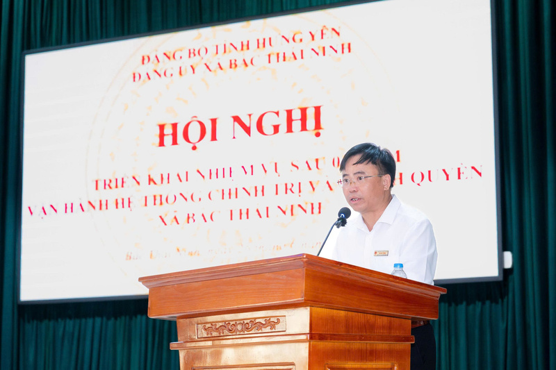 Ông Hà Duy Thiện - Phó Bí thư Đảng ủy, Chủ tịch UBND xã Bắc Thái Ninh báo cáo kết quả triển khai nhiệm vụ sau 1 năm vận hành hệ thống chính trị và chính quyền xã Bắc Thái Ninh - Ảnh: Vũ Hiếu