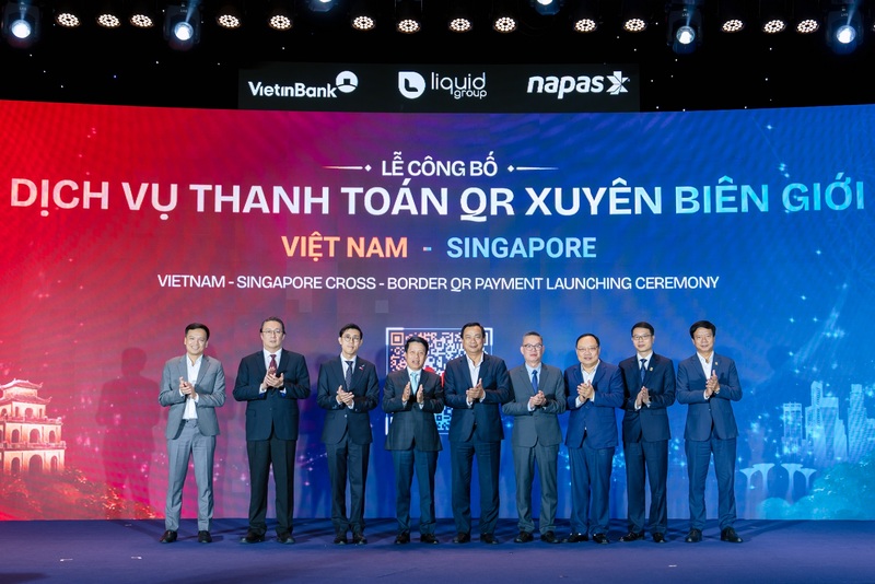Chính thức ra mắt dịch vụ thanh toán mã QR giữa Việt Nam và Singapor. Ảnh: DNCC