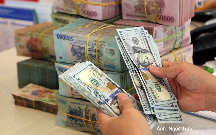 Khi lãi suất USD tăng, đồng USD mạnh lên, từ đó tạo áp lực lên tỷ giá USD/VND.
