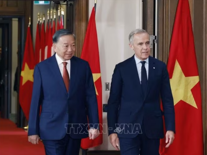 Tổng Bí thư, Chủ tịch nước Tô Lâm và Thủ tướng Canada Mark Carney tại lễ đón. Ảnh: Thống Nhất/TTXVN