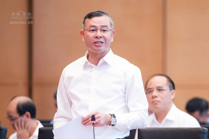 Bộ trưởng Bộ Tài chính Ngô Văn Tuấn giải trình vấn đề đại biểu quan tâm. Ảnh: Quochoi.vn