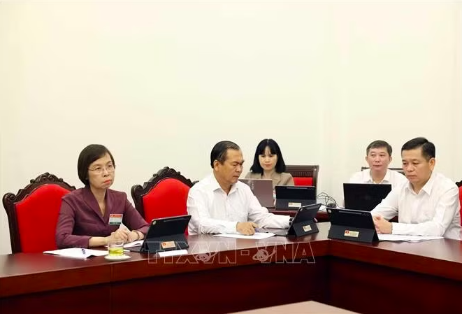 Các đại biểu thảo luận tại tổ. Ảnh: Thống Nhất/TTXVN