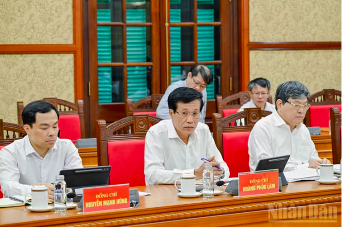 Lãnh đạo Học viện Chính trị quốc gia Hồ Chí Minh dự buổi làm việc. (Ảnh: DUY LINH)