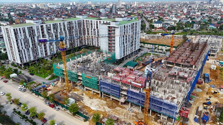 Các địa phương chú trọng việc quy hoạch đất đai để thi công nhà ở xã hội phục vụ người thu nhập thấp. Ảnh: TTXVN